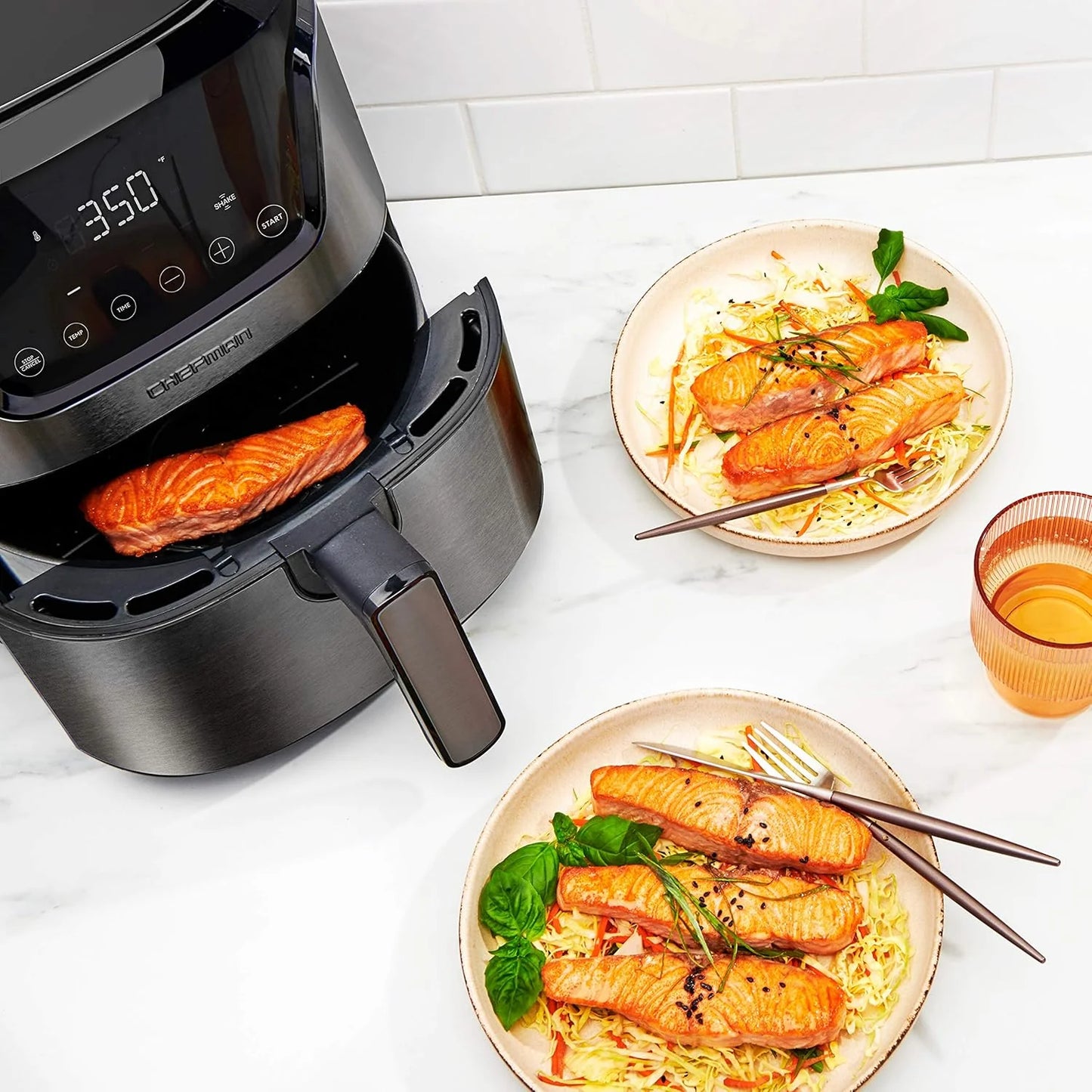 Chefman 6-Quart Double Basket Air Fryer with Easy View Window uses two separate 3-quart nonstick pans.